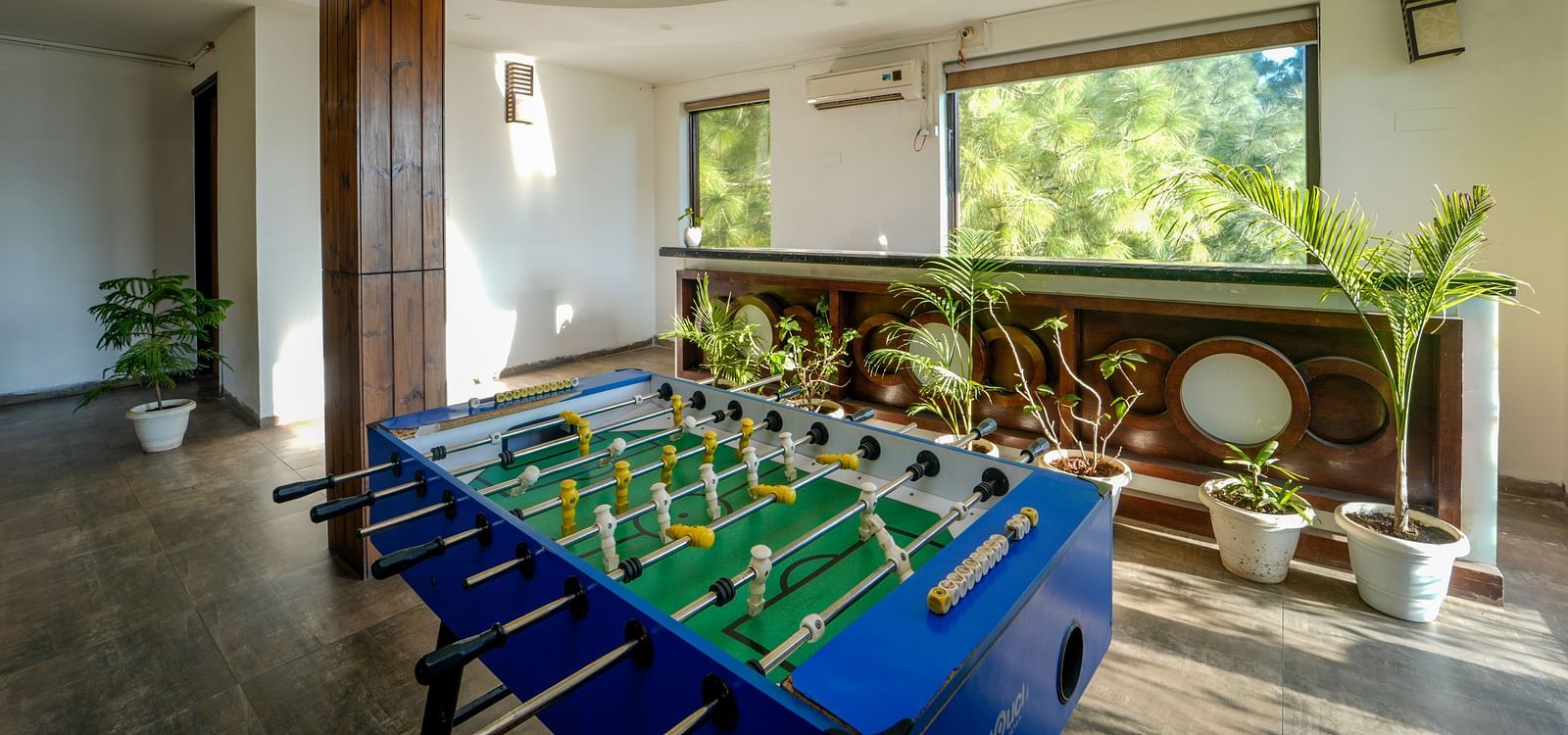 The game area of DLS Whispering Winds featuring a Foosball table